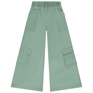 Παντελόνι εβαζέ μονόχρωμο πράσινο υφασμάτινο με τσέπες για κορίτσι 