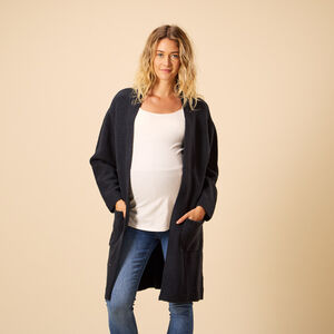 Ζακέτα μακριά μονόχρωμη από πλεκτό με τσέπες για γυναίκες 