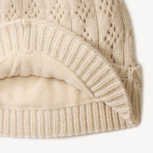 Bonnet bébé fille en tricot pointelle doublé micropolaire à pompon 