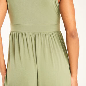 Φόρεμα χωρίς μανίκια, εφαρμοστό και μονόχρωμο, με κόμπο για έγκυες. 