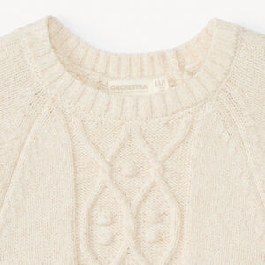 Πλεκτό πουλόβερ μονόχρωμο με πλεκτές κοτσίδες και glitter για κορίτσι 