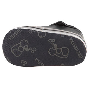 Babies noires montantes à revers et lacets 