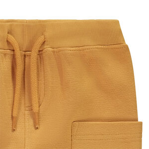 Παντελόνι jogging μονόχρωμο από φούτερ με τσέπες cargo για μωρό αγόρι 