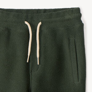 Σετ φόρμας αγοριού με μισό oversized φούτερ και σχέδια με στάμπες. 