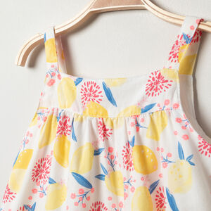 Φόρεμα με τιράντες με σχέδιο λεμόνια σε όλη την επιφάνεια 