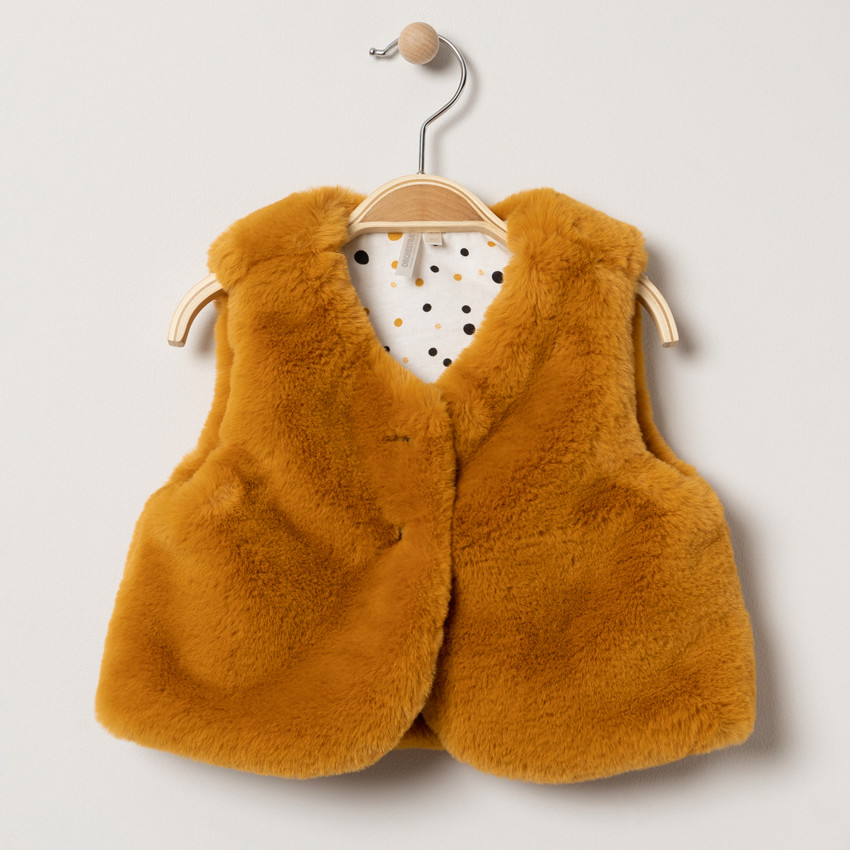 Gilet sans manches en fausse fourrure doublé jersey à pois 