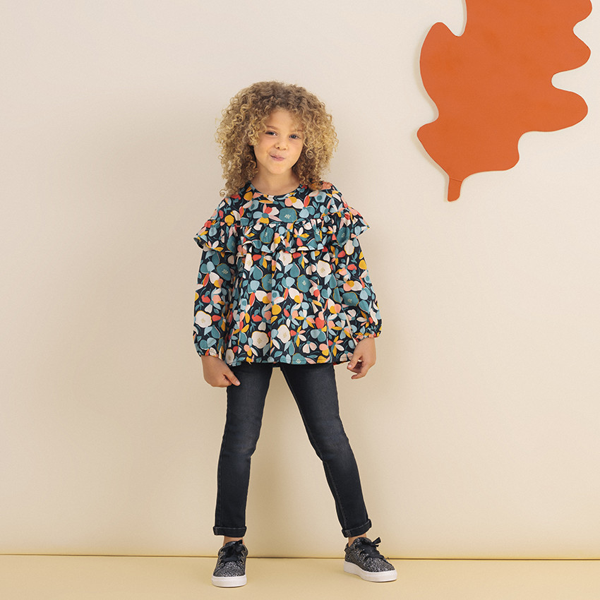 Jean slim effet used à ceinture tressée  