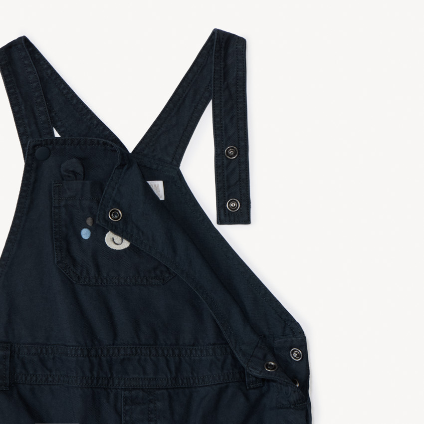 Ολόσωμη φόρμα με παιχνιδιάρικη τσέπη για μωρό αγόρι 