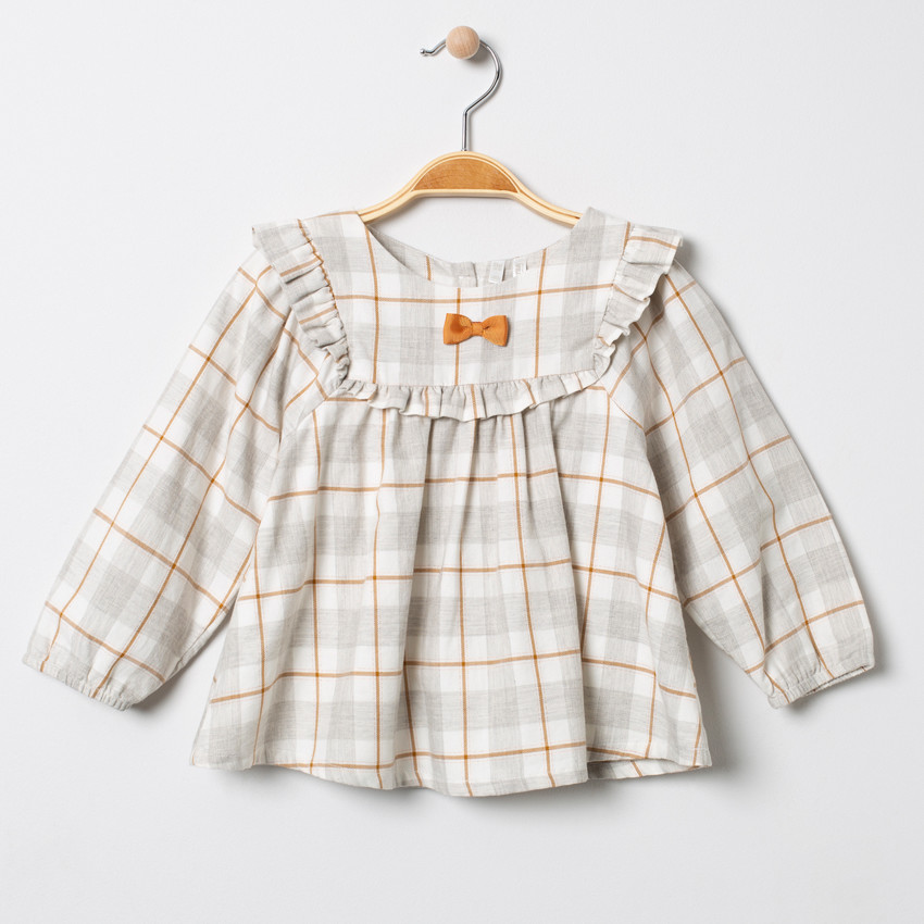 Tunique à carreaux avec noeud et volants 