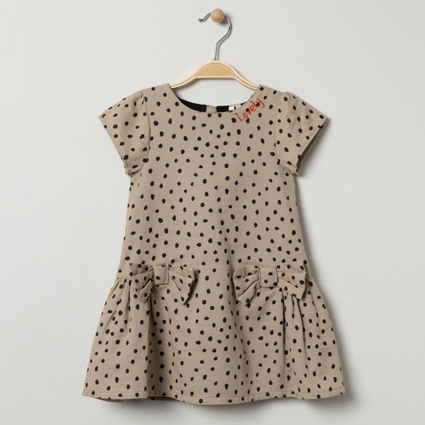 Robe manches courtes à pois all-over et noeuds 
