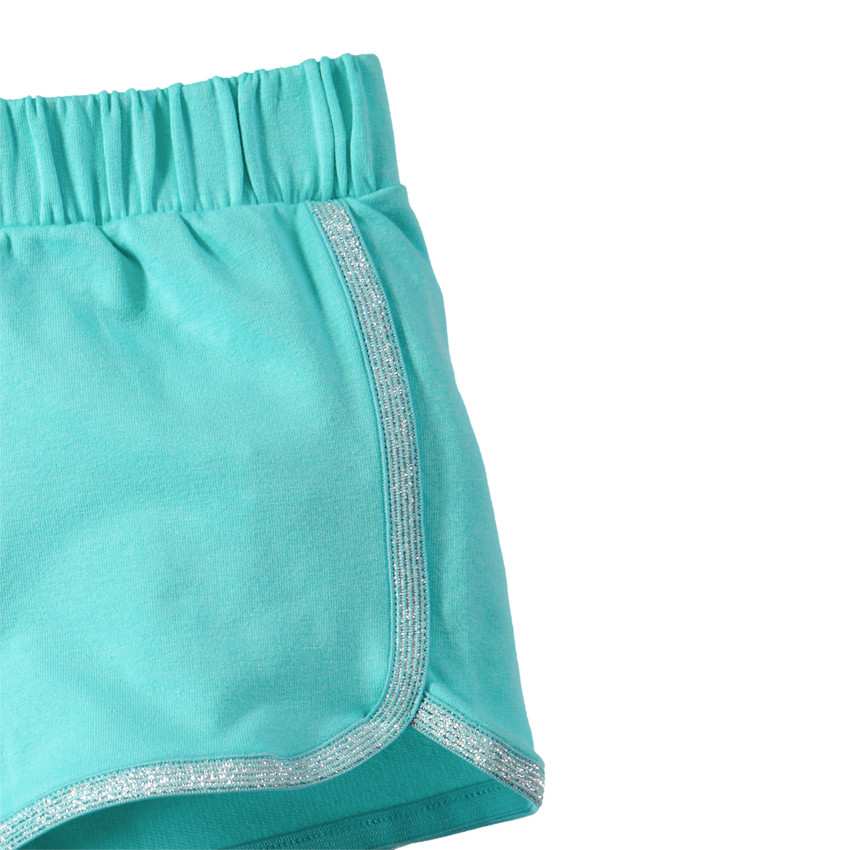 Σύνολο με σχέδιο κοχύλια και σορτσάκι με ασημί τελείωμα. 