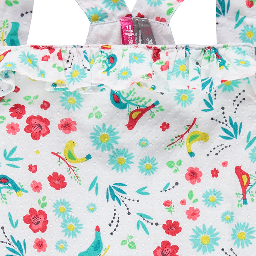 Κοντή ολόσωμη φόρμα με φλοράλ μοτίβο σε όλη την επιφάνεια 