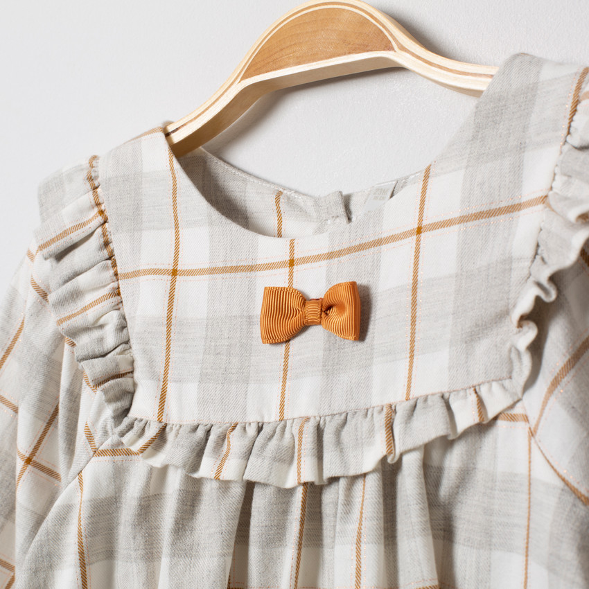 Tunique à carreaux avec noeud et volants 