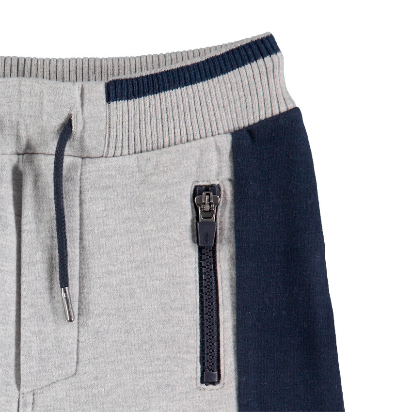 Δίχρωμη φόρμα από φανέλα με φερμουάρ στις τσέπες  