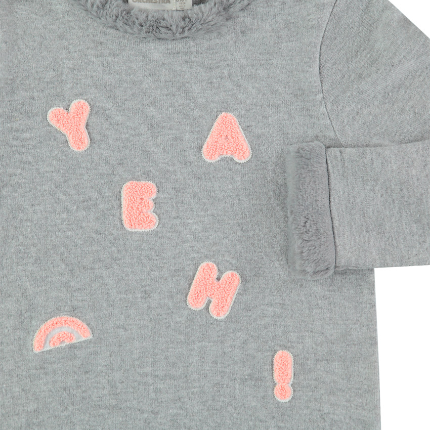 Πλεκτό με μελανζέ όψη και λεπτομέρειες από συνθετική γούνα 