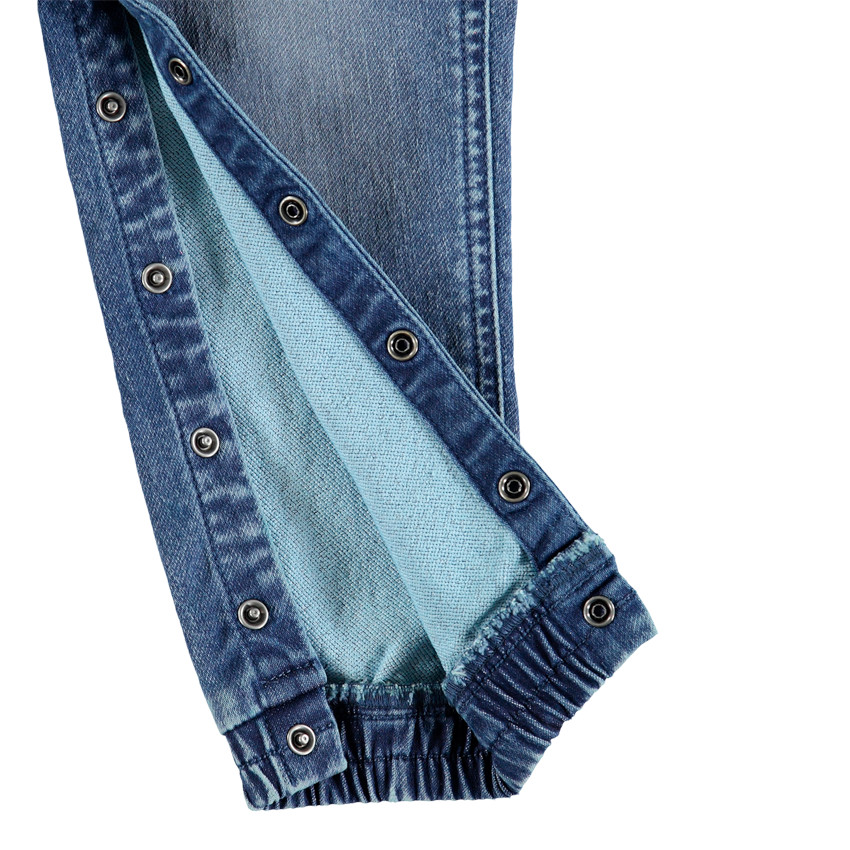 Salopette en jean effet used détails brodés crocodile 