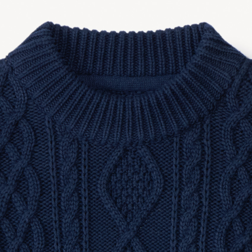 Πλεκτό πουλόβερ μονόχρωμο με εφέ πλεξούδας και πολύχρωμη ρίγα για αγόρι 