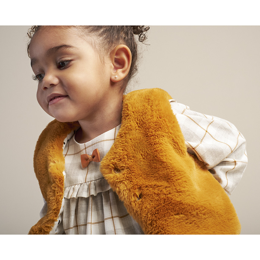 Gilet sans manches en fausse fourrure doublé jersey à pois 