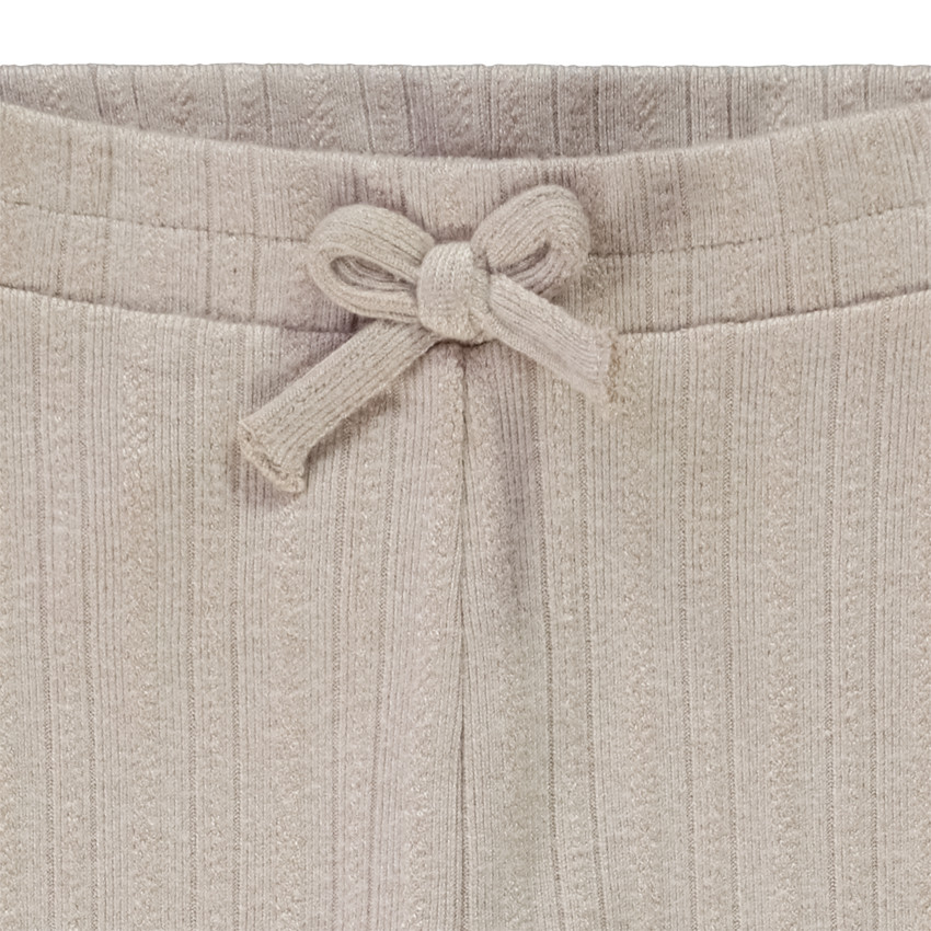 Καλσόν σε jacquard με φανταχτερό φιόγκο για κορίτσι 