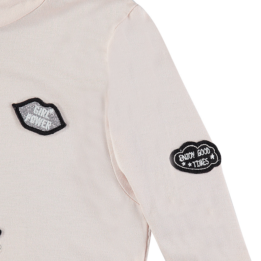 Παιδικά - Μονόχρωμο ζιβάγκο από ζέρσεϊ με απλικέ σήματα 