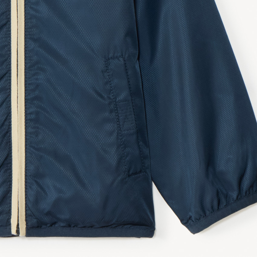 Αδιάβροχο μονόχρωμο μπουφάν με ζέρσεϊ επένδυση για μωρό αγόρι 