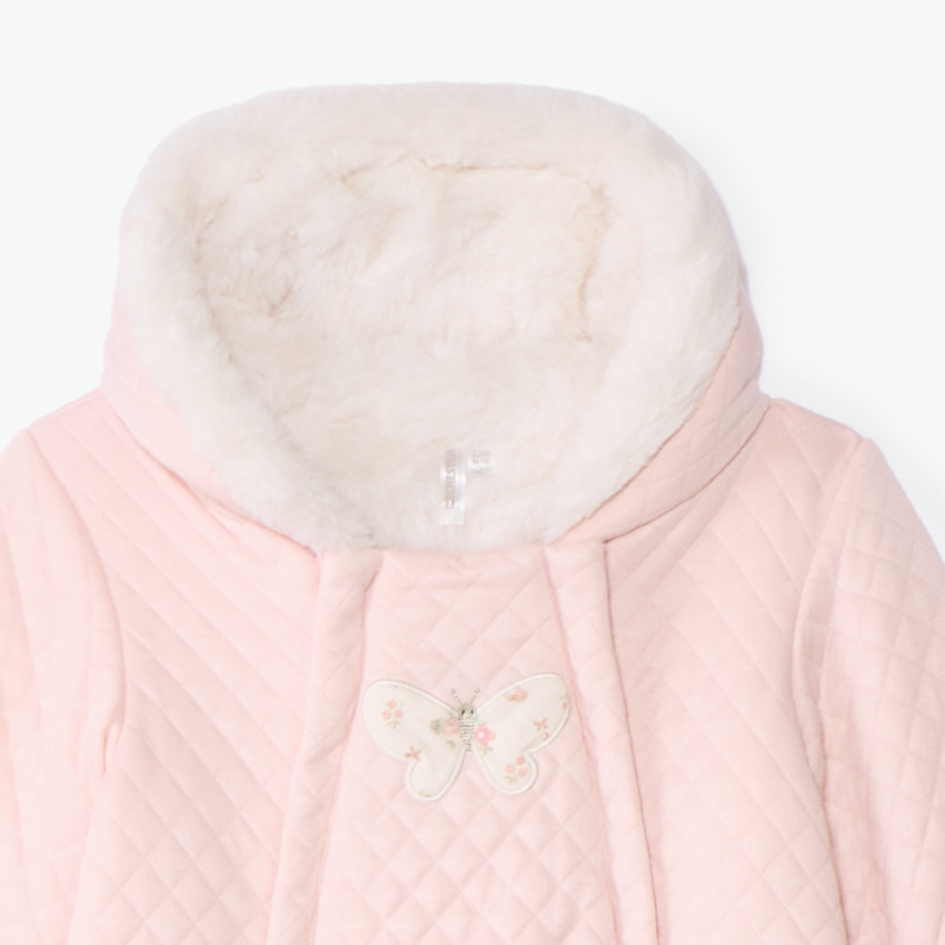 Combi-pilote uni rose en jersey matelassé pour bébé fille avec finitions différentes selon l'âge 