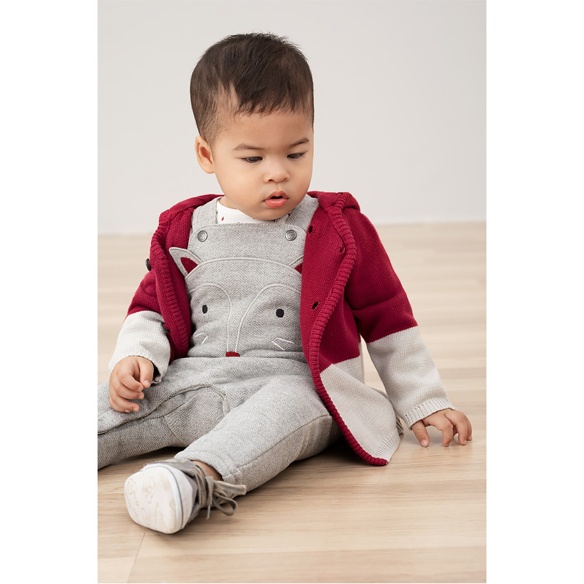 Πλεκτή ζακέτα με διχρωμία και διπλό κούμπωμα 