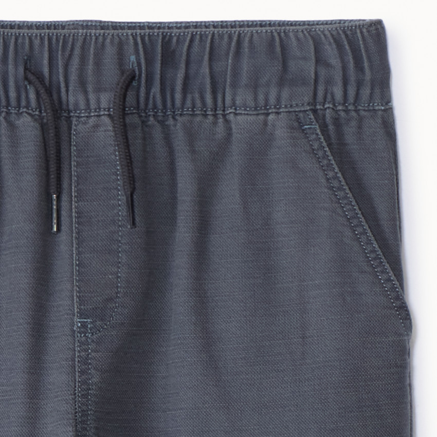 Jean jogger style cargo uni à poches pour garçon 