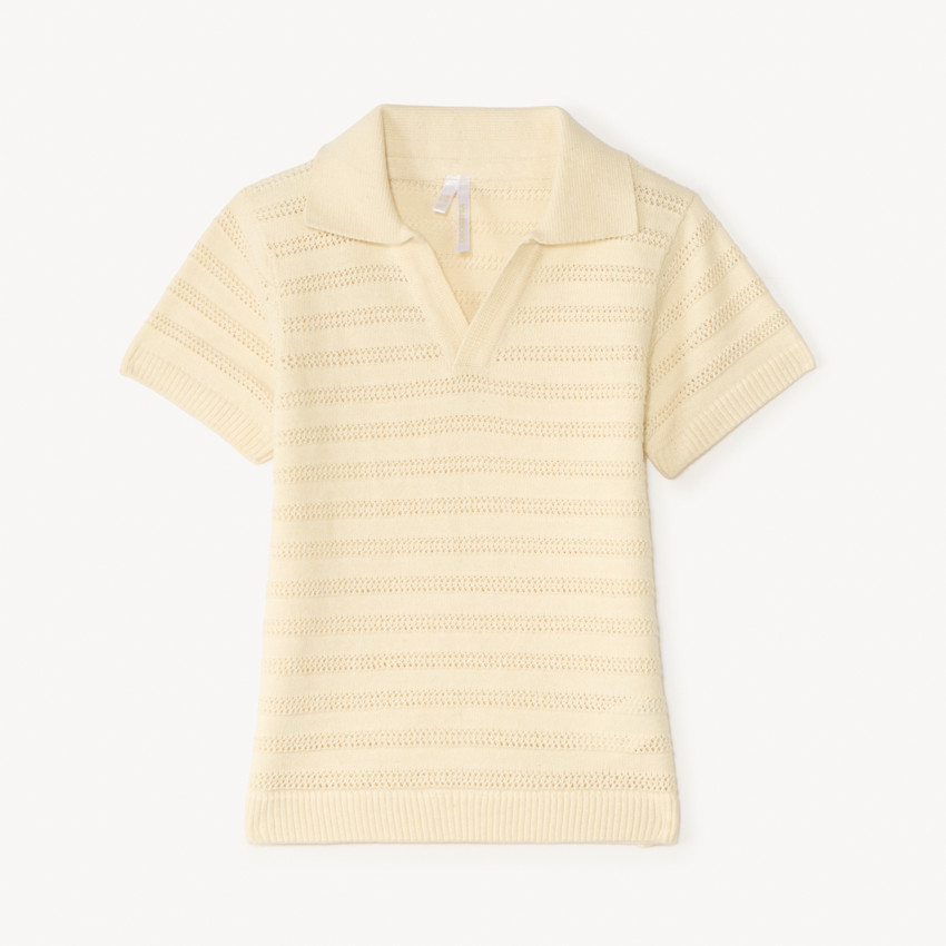 Πολό με κοντά μανίκια και φαντασία σε πλέξη για μωρό αγόρι. 