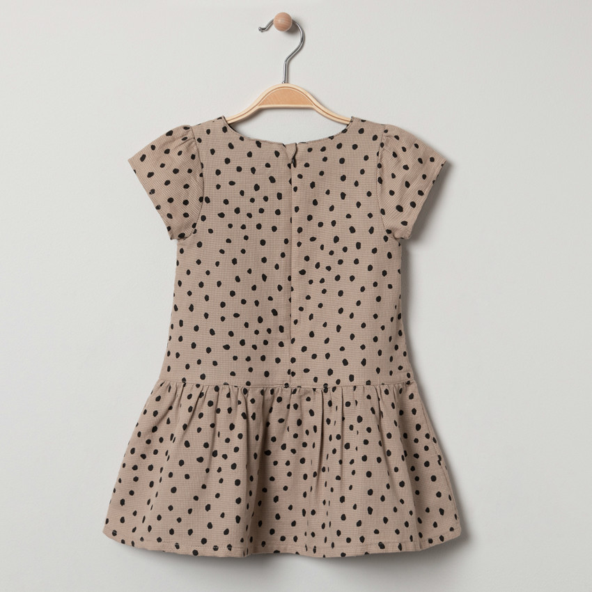 Robe manches courtes à pois all-over et noeuds 