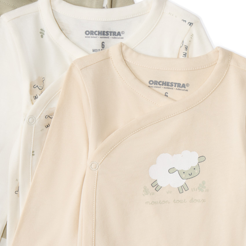 Σετ 7 μακρυμάνικα bodies jersey με φαντεζί σχέδια και διαφορετικά ανοίγματα ανάλογα με την ηλικία 