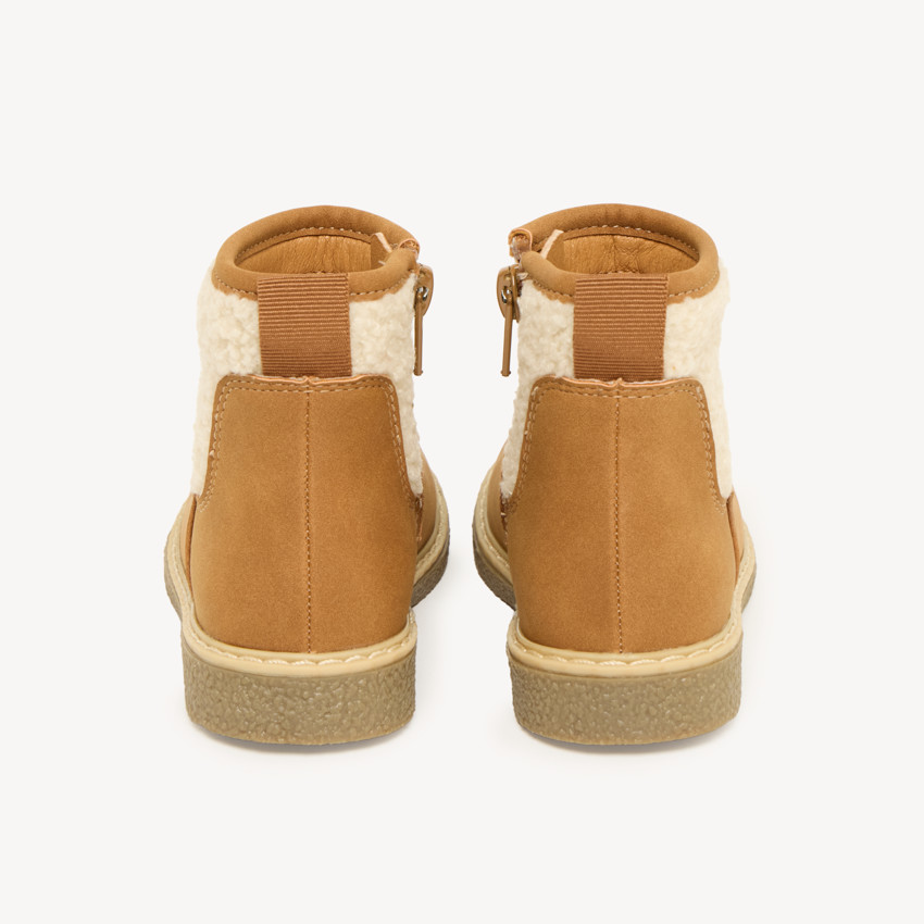 Bottines pour filles à zip marron avec empiècement en moumoute. 