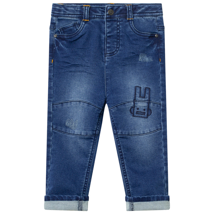 Jean effet used avec broderies contrastées 