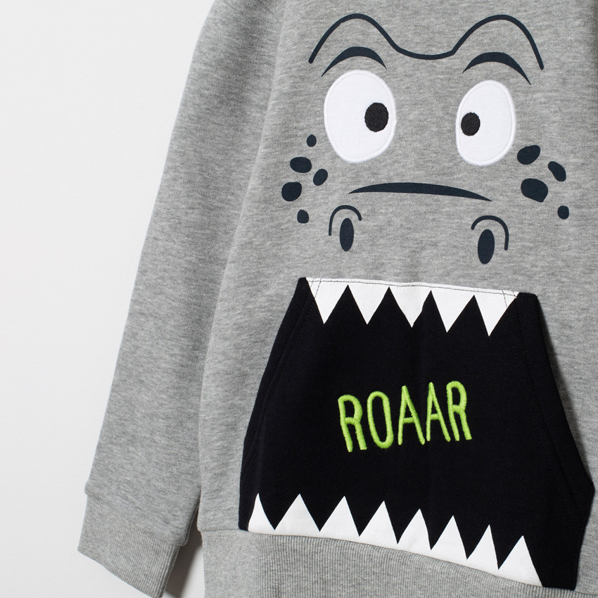 Jogging en molleton print dinosaure et motif camouflage 