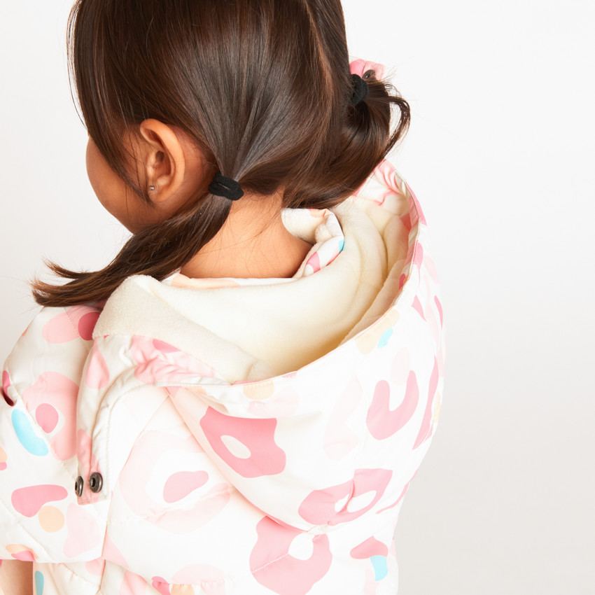 Combi-pilote de ski imprimé arty pour bébé fille avec finitions différentes selon l'âge 