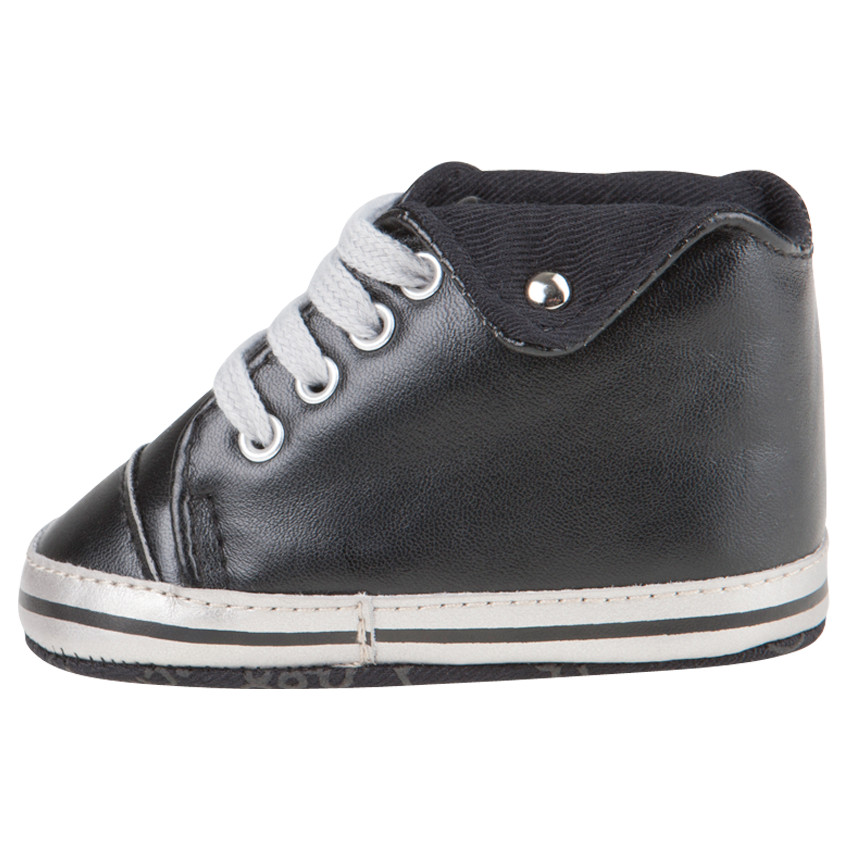 Babies noires montantes à revers et lacets 