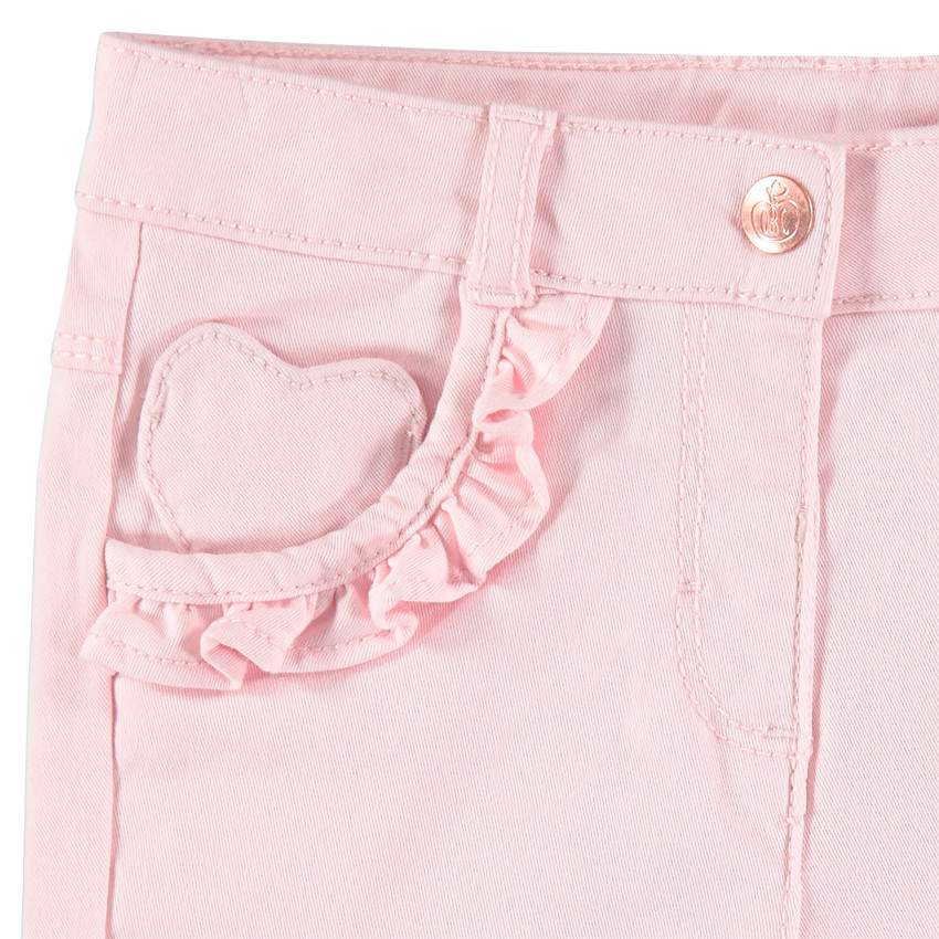 Μονόχρωμο υφασμάτινο παντελόνι με βολάν στις τσέπες 