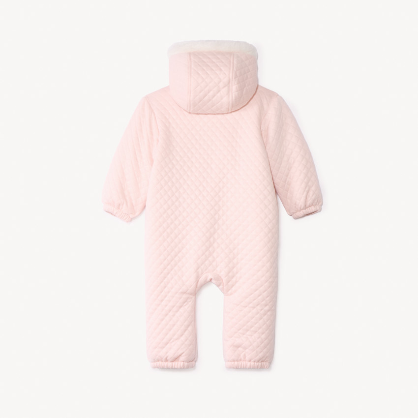 Combi-pilote uni rose en jersey matelassé pour bébé fille avec finitions différentes selon l'âge 