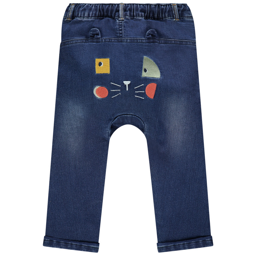 Jean effet used à animal brodé au dos  