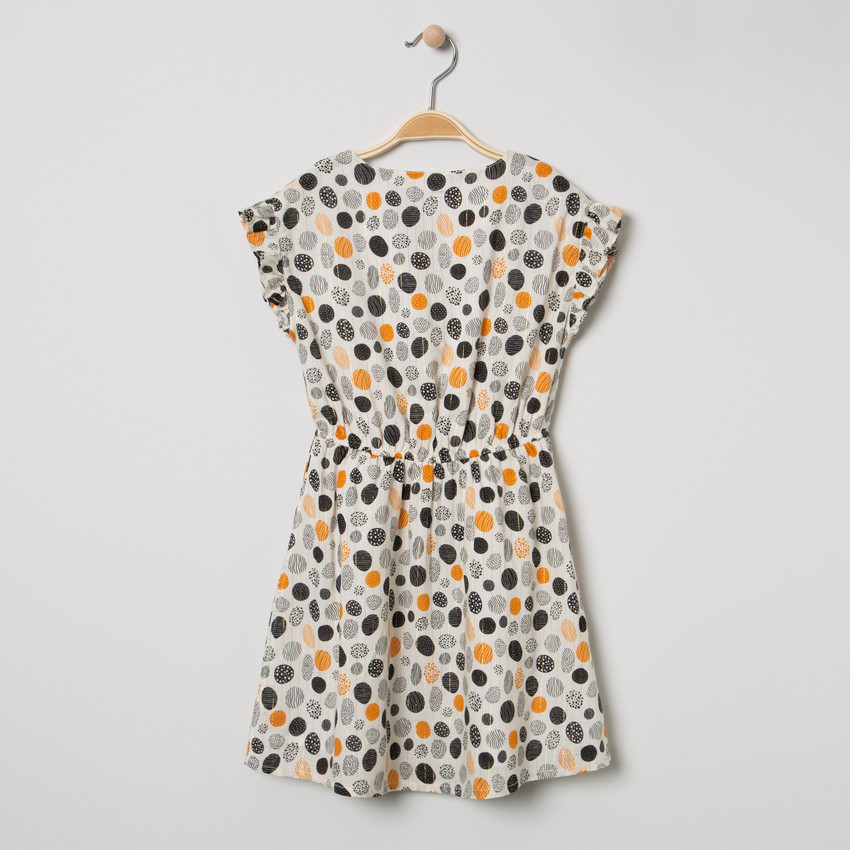 Φόρεμα με κοντό μανίκι και χρωματιστά πουά και χρυσές λεπτομέρειες. 