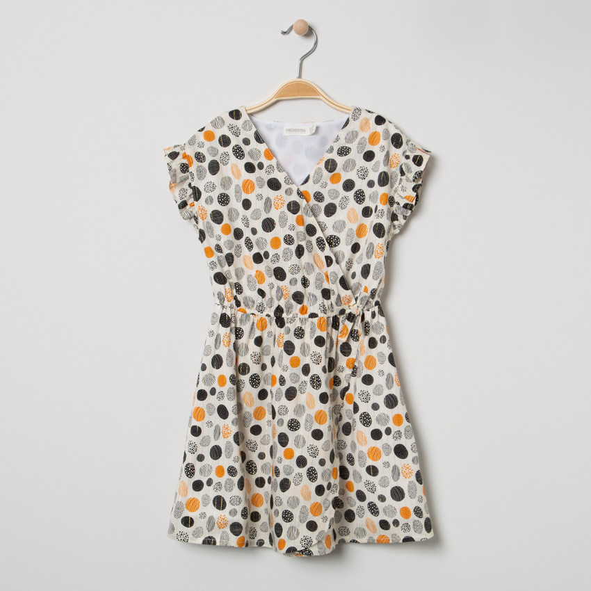 Φόρεμα με κοντό μανίκι και χρωματιστά πουά και χρυσές λεπτομέρειες. 