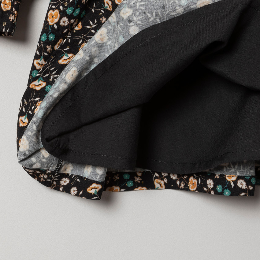 Robe manches longues imprimée fleurs all-over.  