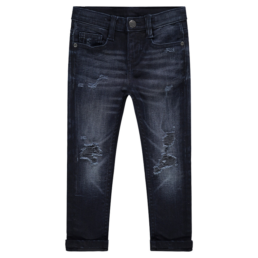 Jeans effet used et crinkle avec déchirures fantaisie 