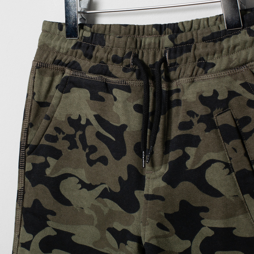 Jogging en molleton print dinosaure et motif camouflage 