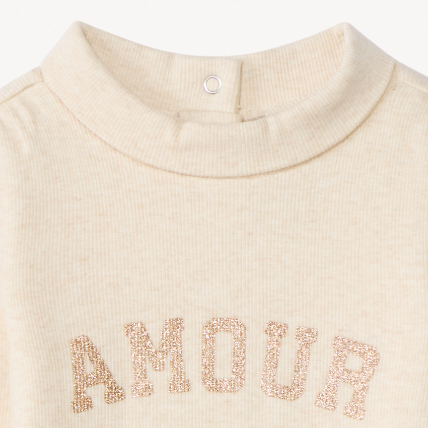 Πλεκτό υποκάμισο με ψηλό γιακά και γυαλιστερή γραφή για μωρό κορίτσι 