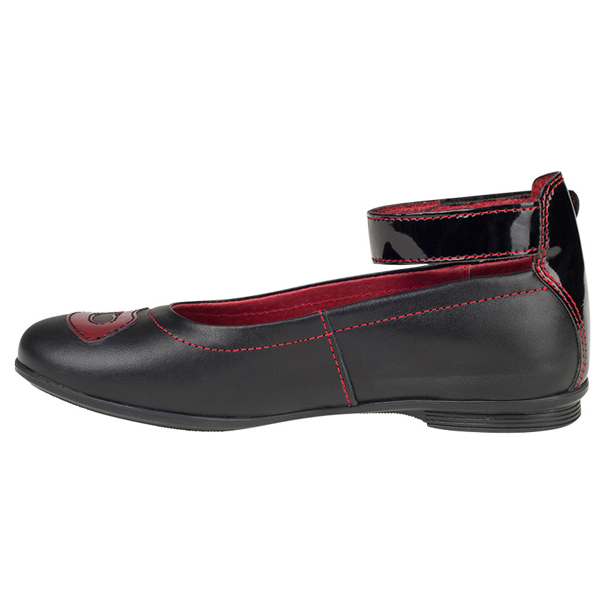 Babies noires en cuir avec bride et patch bouche fantaisie 