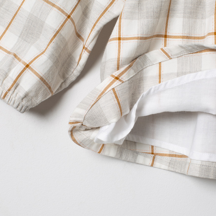 Tunique à carreaux avec noeud et volants 