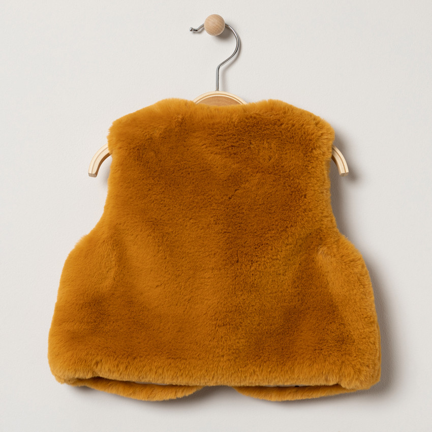 Gilet sans manches en fausse fourrure doublé jersey à pois 