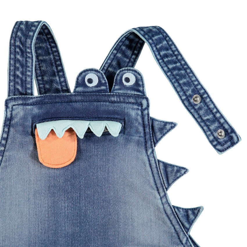 Salopette en jean effet used détails brodés crocodile 