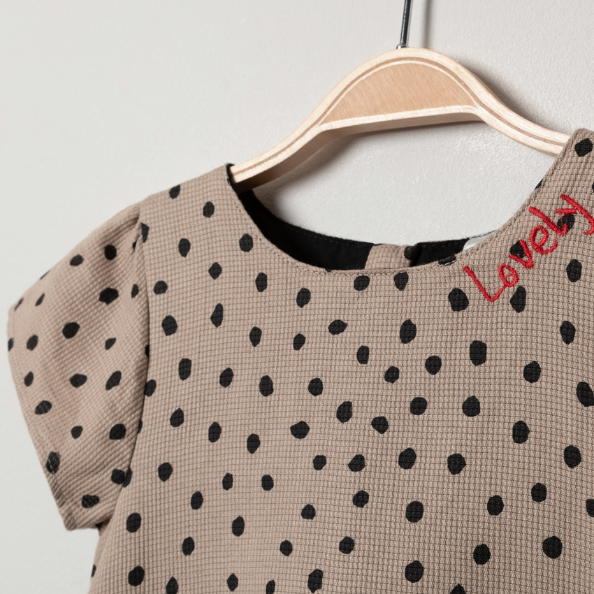 Robe manches courtes à pois all-over et noeuds 